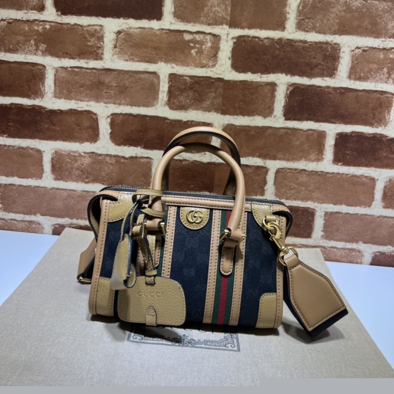 G*u*i top handle bags